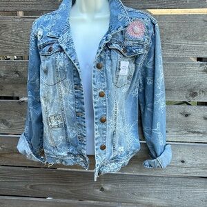 Repurposed and distressed women’s denim jacket by Jagged Threads
